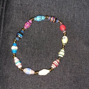 Earthbound colorful paper bracelet.